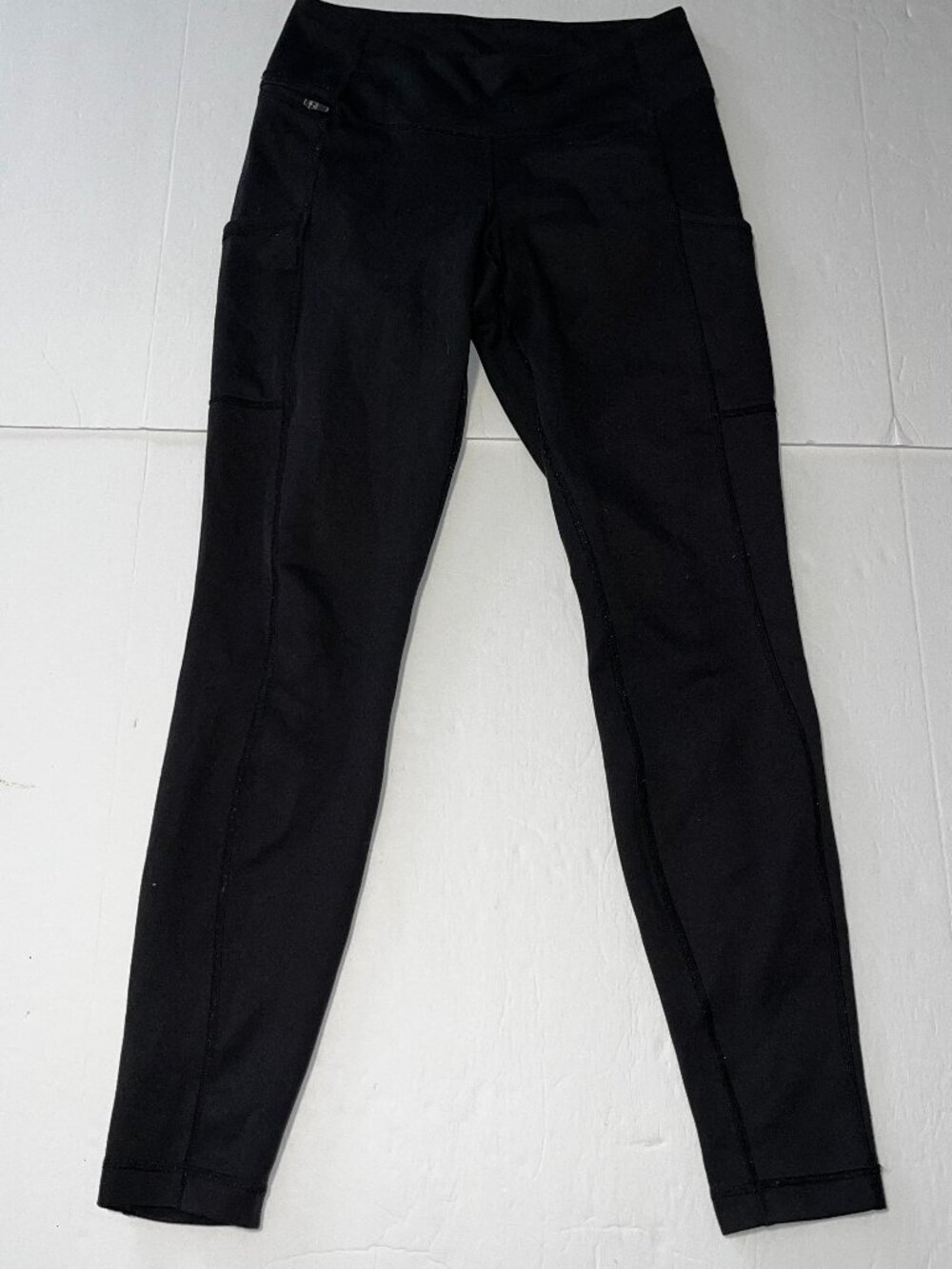 Patagonia women's black athletic leggings zip pocket size small